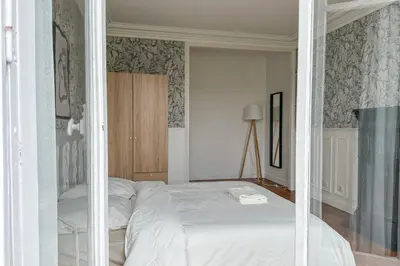 Un ou plusieurs lits dans un hébergement de l'établissement Flexliving - Whole flat - Balard