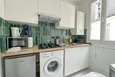 Cuisine ou kitchenette dans l'établissement Flexliving - Whole flat - Balard