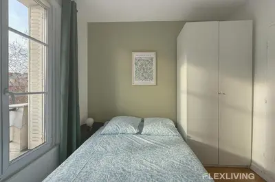 Un ou plusieurs lits dans un hébergement de l'établissement Flexliving - Studio - 27 Brune