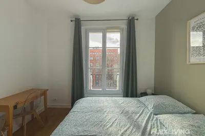 Un ou plusieurs lits dans un hébergement de l'établissement Flexliving - Studio - 27 Brune