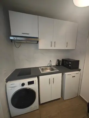 Cuisine ou kitchenette dans l'établissement Séjour à Gare de l'Est