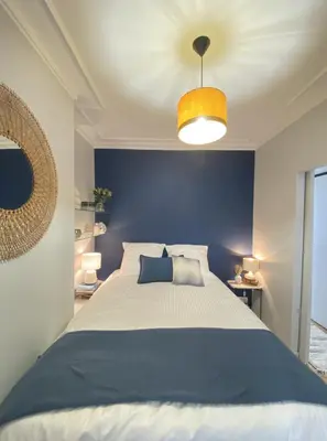 Un ou plusieurs lits dans un hébergement de l'établissement Charm & Comfort Apartment - Heart of Montmartre