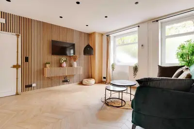 Télévision ou salle de divertissement dans l'établissement REPUBLIQUE - Cozy Appartement L001