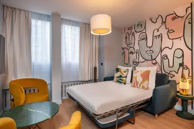 Coin salon dans l'établissement West Paris Suite