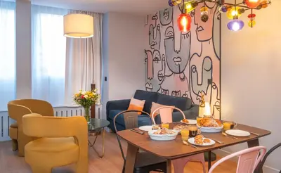 Coin salon dans l'établissement West Paris Suite