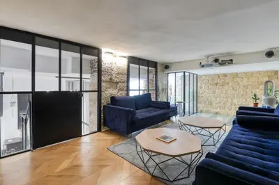 Coin salon dans l'établissement Beautiful loft 130m2 Louvre Palais Royal - II