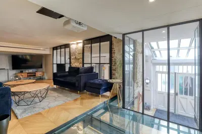 Coin salon dans l'établissement Beautiful loft 130m2 Louvre Palais Royal - II