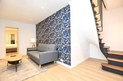 Coin salon dans l'établissement Beautiful Appartement 6p L004