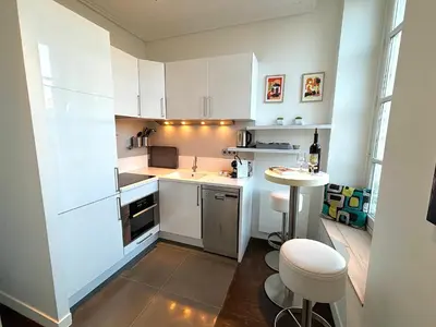 Cuisine ou kitchenette dans l'établissement L'appartement des Archives