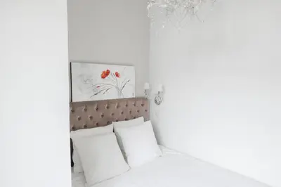 Un ou plusieurs lits dans un hébergement de l'établissement Chic apartment on the Champs-Élysées with AC