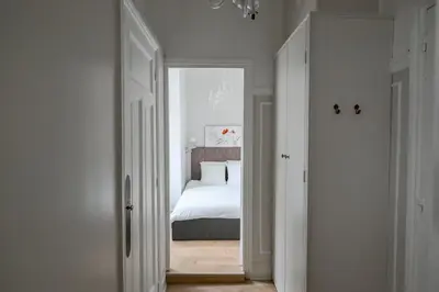 Un ou plusieurs lits dans un hébergement de l'établissement Chic apartment on the Champs-Élysées with AC