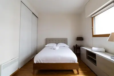 Un ou plusieurs lits dans un hébergement de l'établissement Appartement 2 personnes proche Beaugrenelle - II