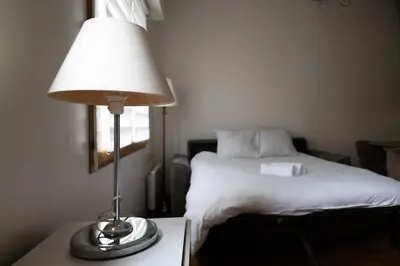 Un ou plusieurs lits dans un hébergement de l'établissement Appartement 2 personnes proche Beaugrenelle - II
