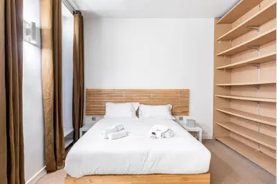 Un ou plusieurs lits dans un hébergement de l'établissement GuestReady - Perfect home in the heart of Paris