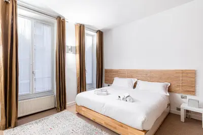 Un ou plusieurs lits dans un hébergement de l'établissement GuestReady - Perfect home in the heart of Paris