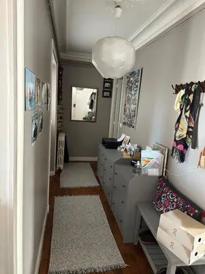 Coin salon dans l'établissement Chambre touristique