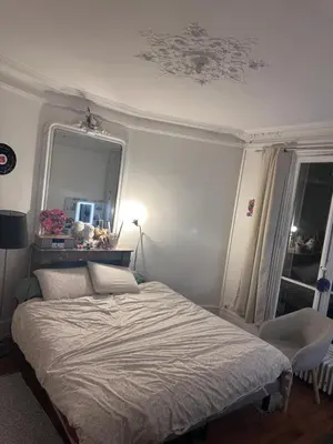 Un ou plusieurs lits dans un hébergement de l'établissement Chambre touristique