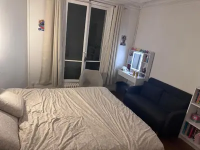Un ou plusieurs lits dans un hébergement de l'établissement Chambre touristique