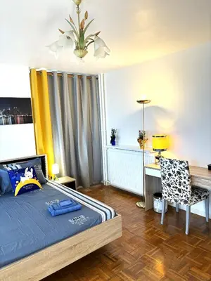 Un ou plusieurs lits dans un hébergement de l'établissement Grande Chambre ARENA