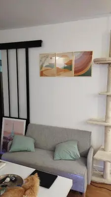 Coin salon dans l'établissement Chambre chez l'habitant à Paris centre
