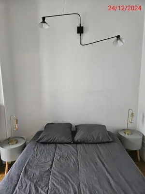 Un ou plusieurs lits dans un hébergement de l'établissement Cosy private room in Shared appartment with a couple - room for 1 traveler only ! no duo allowed