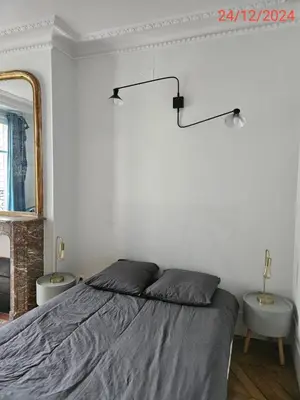 Un ou plusieurs lits dans un hébergement de l'établissement Cosy private room in Shared appartment with a couple - room for 1 traveler only ! no duo allowed