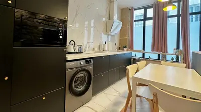 Cuisine ou kitchenette dans l'établissement Loft moderne Saint-Ambroise