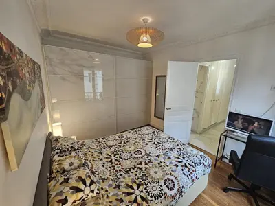Un ou plusieurs lits dans un hébergement de l'établissement Montmartre beautiful 67 m2 Apartment with Gym & Balcony