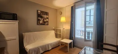 Un ou plusieurs lits dans un hébergement de l'établissement Studio 103 Bail mobilité - Appartement pour voyages d'affaires et d'études