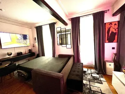 Télévision ou salle de divertissement dans l'établissement Paris Expo Porte de Versailles confort appartement