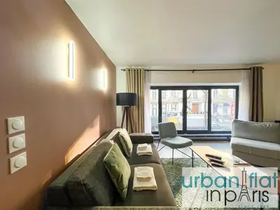 Coin salon dans l'établissement Urban Flat 194 - Spacious 3 Bedroom Montmartre