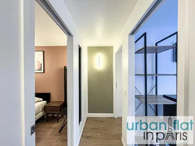 Un ou plusieurs lits dans un hébergement de l'établissement Urban Flat 194 - Spacious 3 Bedroom Montmartre
