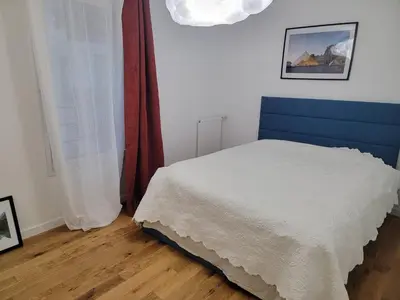 Un ou plusieurs lits dans un hébergement de l'établissement Chambre cosy près de Paris dans un appartement partagé
