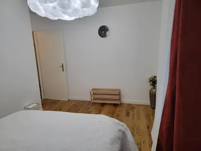 Un ou plusieurs lits dans un hébergement de l'établissement Chambre cosy près de Paris dans un appartement partagé
