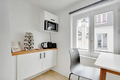 Cuisine ou kitchenette dans l'établissement Résidence Antoine - 2P ou 4P -Bastille