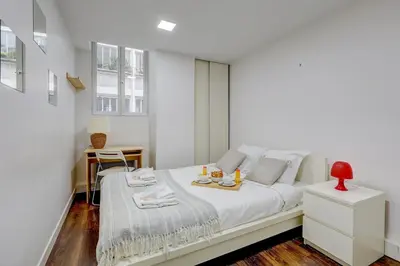 Un ou plusieurs lits dans un hébergement de l'établissement Bluestay 224 - Superb apartment in Paris