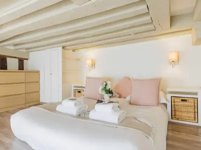 Un ou plusieurs lits dans un hébergement de l'établissement Charming apartment - Marais - Mobility lease