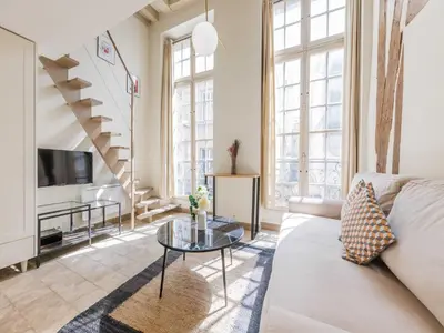 Coin salon dans l'établissement Charming apartment - Marais - Mobility lease