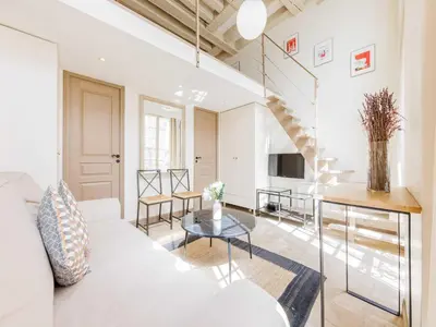 Coin salon dans l'établissement Charming apartment - Marais - Mobility lease