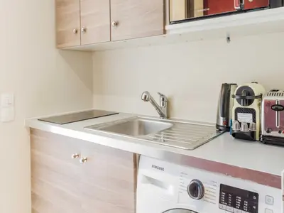 Cuisine ou kitchenette dans l'établissement Charming apartment - Marais - Mobility lease