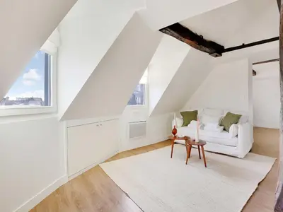 Un ou plusieurs lits dans un hébergement de l'établissement Cosy flat ideally - heart of Paris