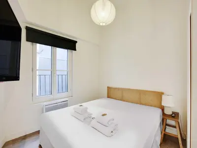 Un ou plusieurs lits dans un hébergement de l'établissement Cosy flat ideally - heart of Paris