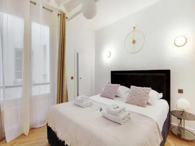 Un ou plusieurs lits dans un hébergement de l'établissement Charming flat at the foot of Les Halles