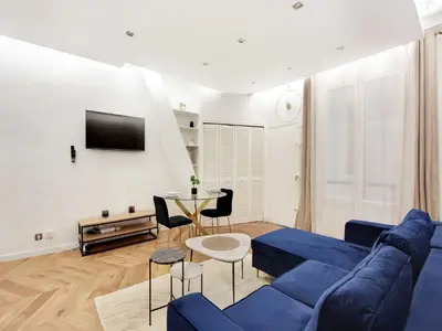 Télévision ou salle de divertissement dans l'établissement Charming flat at the foot of Les Halles