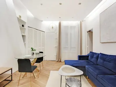 Coin salon dans l'établissement Charming flat at the foot of Les Halles