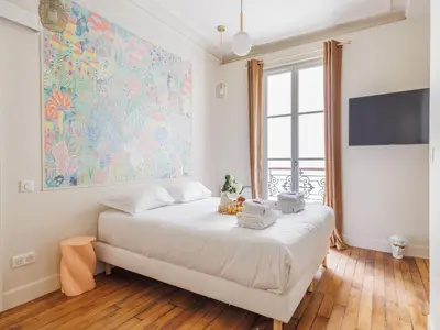 Un ou plusieurs lits dans un hébergement de l'établissement Charming apartment - 1BDR 2P - St Germain des Prés
