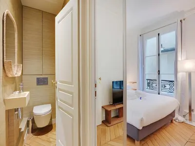 Un ou plusieurs lits dans un hébergement de l'établissement Stunning apartment - 1BR-4P- Jardin du Luxembourg