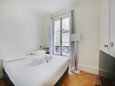 Un ou plusieurs lits dans un hébergement de l'établissement Stunning apartment - 1BR-4P- Jardin du Luxembourg