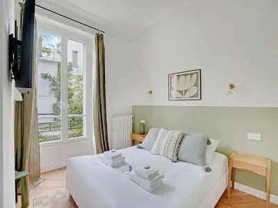 Un ou plusieurs lits dans un hébergement de l'établissement Superb apartment 2BDR 6P- Mairie de Neuilly