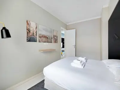 Un ou plusieurs lits dans un hébergement de l'établissement Super flat near Grands Boulevards - Mobility lease